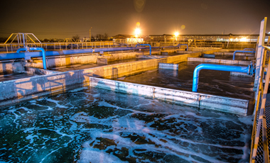 Modern-wastewater-treatment-plant-of-chemical-factory-at-night.-Water-purification-tanks-936322446_2125x1417
